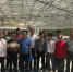 图为原居住在大窝凼的12户移民代表与“中国天眼”项目人员合影。　黄蕾瑾 摄 - 贵州新闻