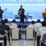 图为论坛现场乐队用正安吉他演奏歌曲。中新社记者 瞿宏伦 摄 - 贵州新闻